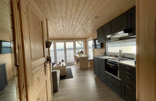 St. Andreas Boat Rental | Houseboat Janne Lübeck including canoe, SUP and WLAN 50 MBit s Flat