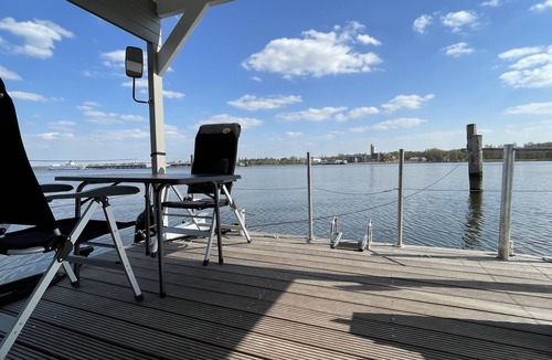 St. Andreas Boat Rental | Houseboat Janne Lübeck including canoe, SUP and WLAN 50 MBit s Flat