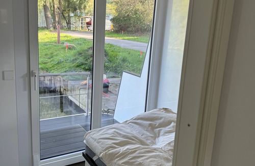Dobin am See Boat Rental | Houseboat 'Kitilou' with Lake View, Private Terrace, and Wi-Fi