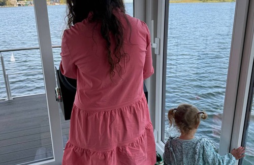 Dobin am See Boat Rental | Houseboat 'Kitilou' with Lake View, Private Terrace, and Wi-Fi