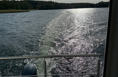 Dobin am See Boat Rental | Houseboat 'Kitilou' with Lake View, Private Terrace, and Wi-Fi