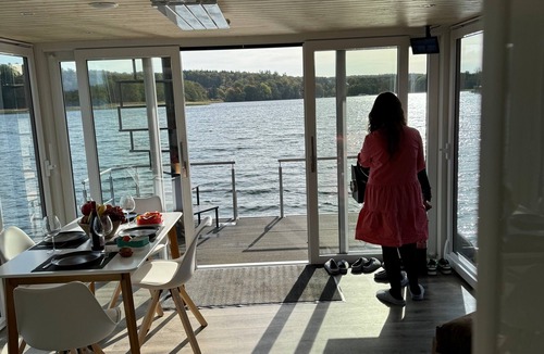 Dobin am See Boat Rental | Houseboat 'Kitilou' with Lake View, Private Terrace, and Wi-Fi