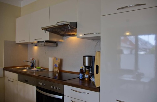 Burg auf Fehmarn Apartment | Inselblume 06 - Vacation home with fireplace at the Reiterkoppel