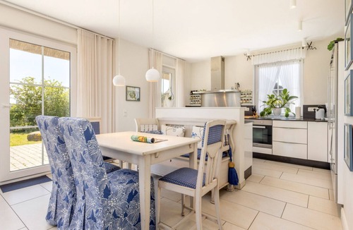 Dranske House | "Küstenperle" Vacation Home in Dranske – enjoy a dream vacation with a breathtaking view of the Bodden and the Baltic Sea. Child-friendly amenities, as well as a wellness area with a sauna and hot tub.