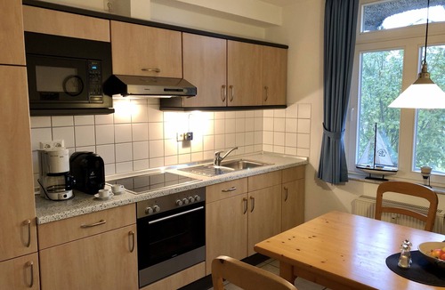 Stolpe auf Usedom Condo | Landhaus am Haff, apartment A7 - relaxation under the reed roof from the very beginning