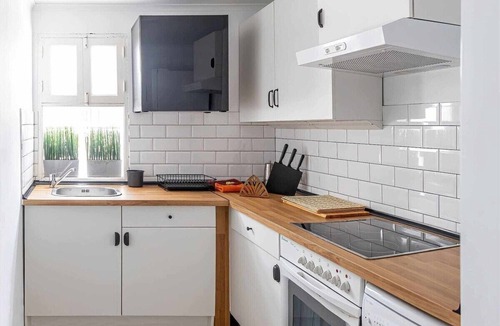 Playa Honda Apartment | Le Family Palms · Eco-Boho Patio & BBQ by Bayside