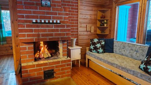 Sonka Other | Log cabin on the banks of Ounasjoki River