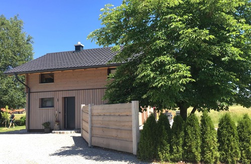Aitrang House | Luxurious solid-wood house with pool and sauna for 4 people in Allgäu