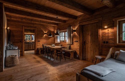 Scheffau am Wilden Kaiser Villa | Luxury old wood mountain chalet in a sunny secluded location with gym, sauna & whirlpool