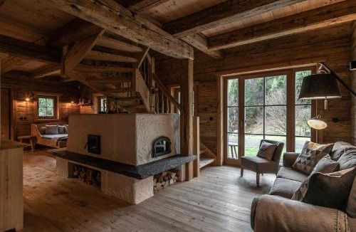 Scheffau am Wilden Kaiser Villa | Luxury old wood mountain chalet in a sunny secluded location with gym, sauna & whirlpool