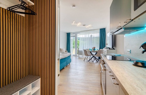 Uhldingen-Muehlhofen Apartment | Mainaublick 4-Star Apartment, 5 min to Lake, Sauna, Pool & Balcony with Mainau View