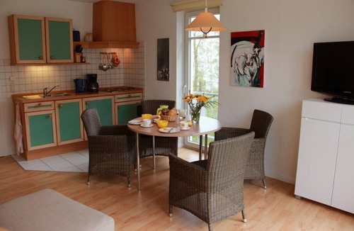 Gohren Apartment | Modern bright apartment, sea view, first row - 200m to the beach, quiet