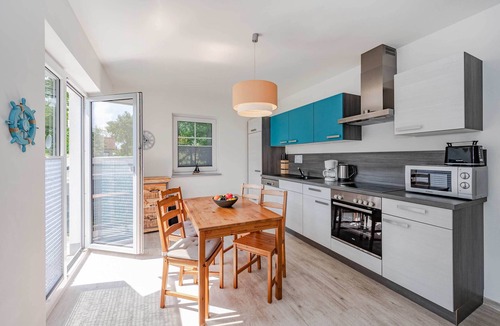 Heringsdorf Apartment | Modern vacation apartment in Heringsdorf with balcony & garden view near the beach
