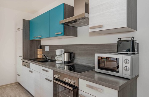 Heringsdorf Apartment | Modern vacation apartment in Heringsdorf with balcony & garden view near the beach