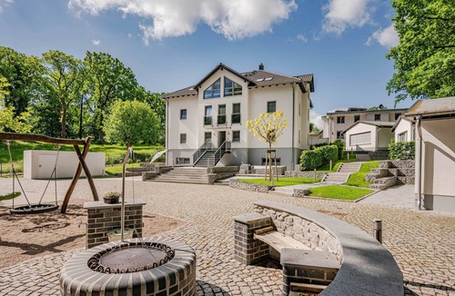 Heringsdorf Apartment | Modern vacation apartment in Heringsdorf with balcony & garden view near the beach