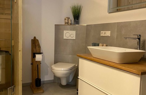 Wingertsberg Apartment | Modern vacation apartment in the heart of the Spessart Nature Park with sauna and terrace