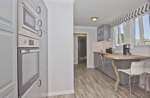 Gohren Apartment | Modern vacation apartment in a central location, close to the beach - Kurhaus Nordstrand FeWo 43