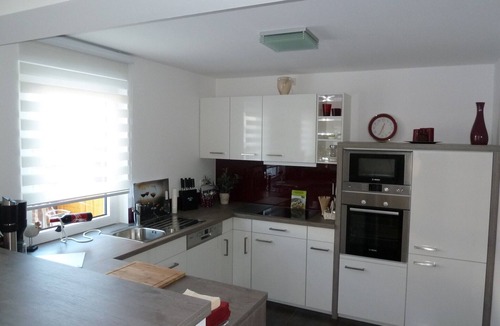 Ratekau House | Modern vacation home -fireplace-sauna-wellness-nature-Baltic Sea-quiet-3 bedrooms