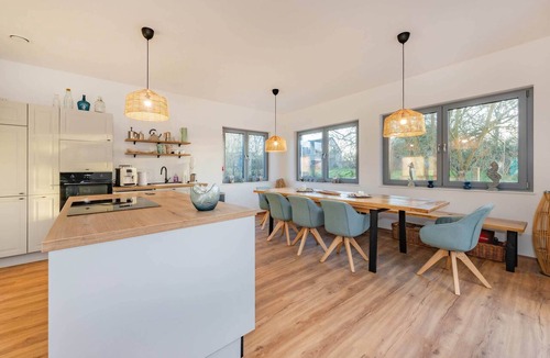 Usedom House | Modern vacation home "Haffhus" for up to 10 people with garden and balcony
