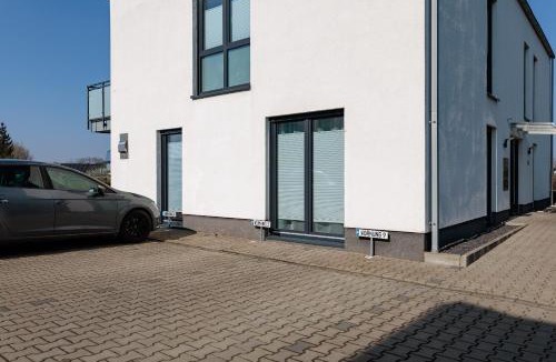 Ibbenbueren Apartment | Modernes Apartment mit Terrasse & Garten, Parkplatz & 24h Self-Check-in