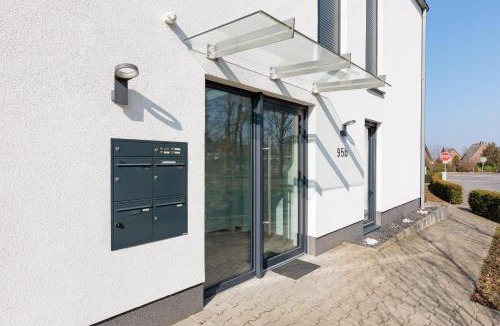 Ibbenbueren Apartment | Modernes Apartment mit Terrasse & Garten, Parkplatz & 24h Self-Check-in