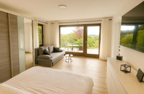 Buchenberg Apartment | Modernes Apartment mit 180° Bergblick