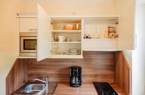 Bad Fuessing Apartment | Modernes App. (44m2), Wohn-/Schlafbereich getrennt