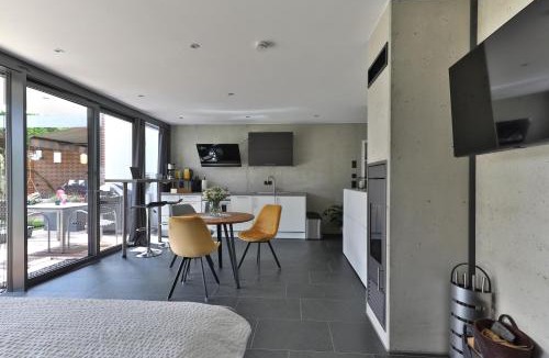 Gersthofen Apartment | Modernes Studio-Apartment - Gartenblick