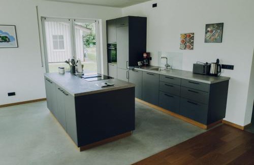 Breitbrunn a. Chiemsee Apartment | Neubau Grüner Wolpertinger Designwhg 106qm Barrierefrei