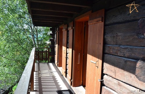 St. Luc Ski Chalet | Outside : two-storey flat for 6 persons in a chalet, south-west-terrace and balcony with garden furn