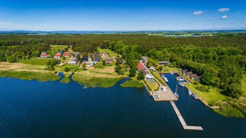 Rankwitz House | Reethus-am-Hafen Reetdachhaus Hafenblick mit Garten und Blick aufs Wasser