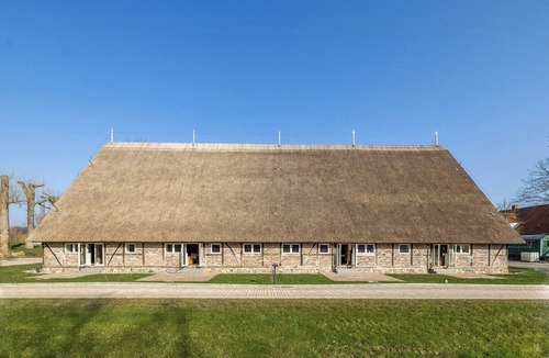 Ratekau House | Relax in a thatched barn with a sauna