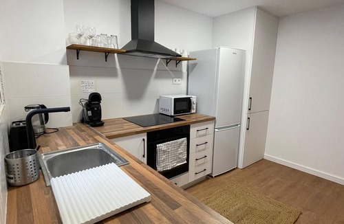 Can Gibert del Pla Apartment | Renovated apartment near Girona for families, couples, friends, and cyclists