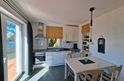 Quilitz House | Seeadler House with two units, water view, surrounded by greenery, sauna, fireplace, fence