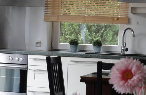 Quilitz House | Seeadler House with two units, water view, surrounded by greenery, sauna, fireplace, fence