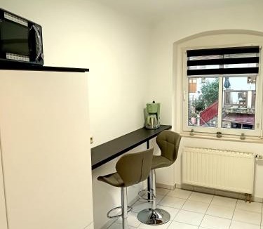 Niederrathen Apartment | Seyfarthrooms - Ferienwohnung Zum Dorfladen Rathen - zentrale Lage mit direkter Anbindung an das Wanderwegenetz, moderne Inneneinrichtung