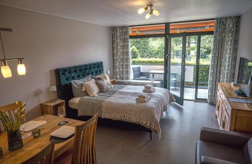 Sudrandweg Apartment | Sonnenstube - Westbalkon, Ruhige Lage, Sauna, Pool, Seenähe, Dachterrasse
