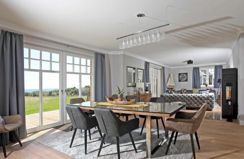 Lobbe Villa | Strandhaus 7 "Ostsee" in Lobbe mit Meerblick, Sauna, Kamin