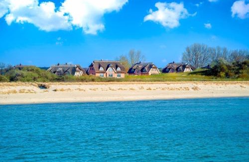 Lobbe Villa | Strandhaus "Oie" in Lobbe mit Meerblick, Kamin, Sauna