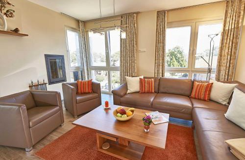 Ostseebad Baabe Apartment | Strandvilla Baabe - WG 11 "Bernstein" mit Meerblick, Kamin, Sauna