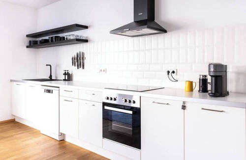 Memmingen Apartment | stycoz - Modern loft - 80 m2 - Kitchen - Parking