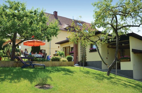 Konigstein an der Elbe House | This cozy vacation home in the garden of a family house in Königstein stands high above the river va