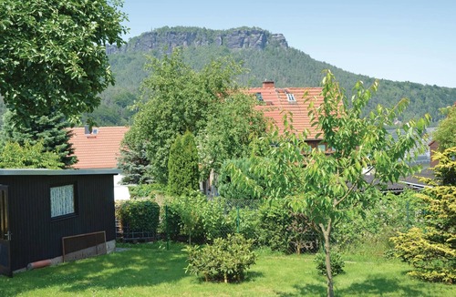 Konigstein an der Elbe House | This cozy vacation home in the garden of a family house in Königstein stands high above the river va