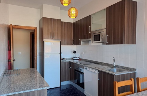 Boiro Apartment | Torre Plaza 4. A cozy apartment in Boiro, beaches and terraces.