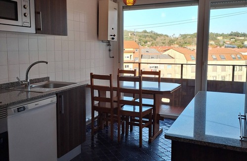 Boiro Apartment | Torre Plaza 4. A cozy apartment in Boiro, beaches and terraces.