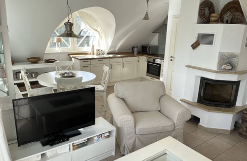 Zingst Apartment | Two-story vacation rental near the beach with a fireplace