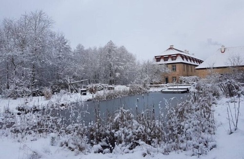 Bastheim Apartment | Unique vacation apartment with a view over the monastery grounds and the romantic garden (60sqm)