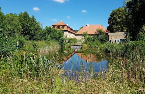 Bastheim Apartment | Unique vacation apartment with a view over the monastery grounds and the romantic garden (60sqm)