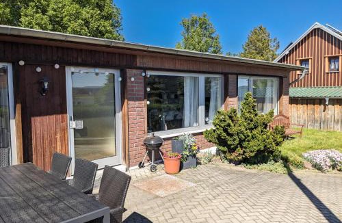 Lichtenhain Apartment | Urlaubsmagie - Ferienwohnung Wildblume - Terrasse, Grill & Saisonaler Pool - W4