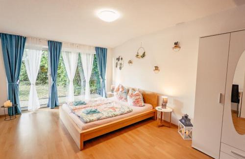 Lichtenhain Apartment | Urlaubsmagie - Ferienwohnung Waldweg - mit Grill, Terrasse & saisonalem Pool - W5